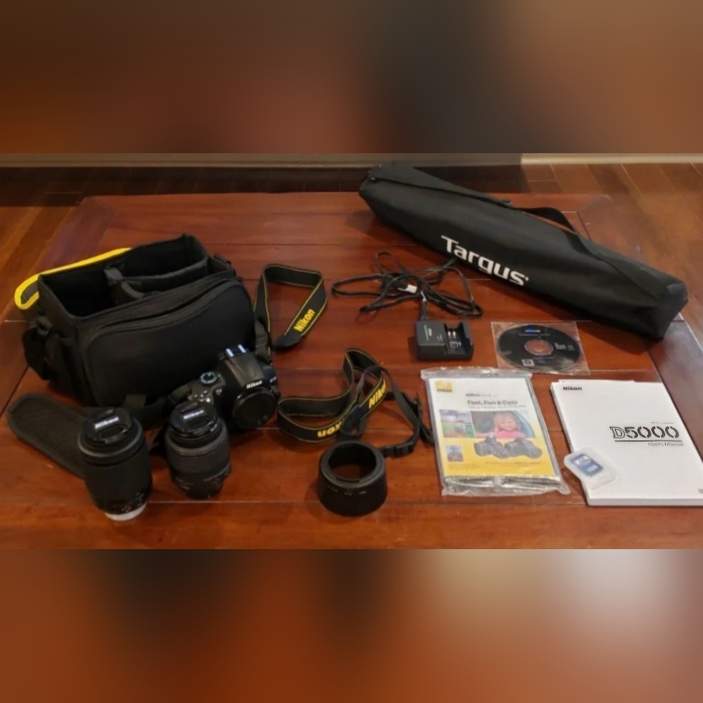 Not for sale. Nikon D5000 Camera with tripod Bundle